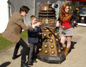 Dalek Invasion of Portsmouth 2013: The Eleventh Doctor, Amy, a Dalek and a boy.